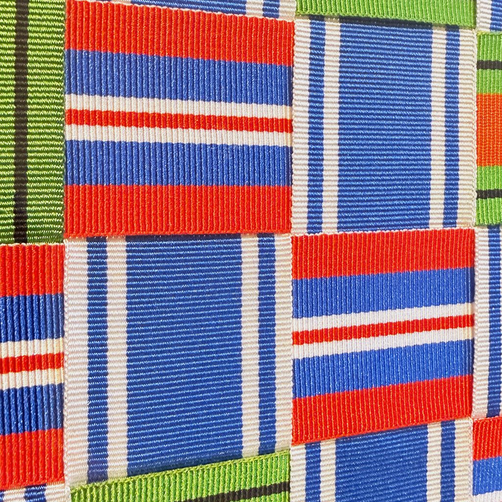 Close up of ribbon weaving showing precision and care